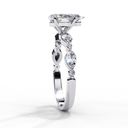 Pear Diamond Ring with Side Stones