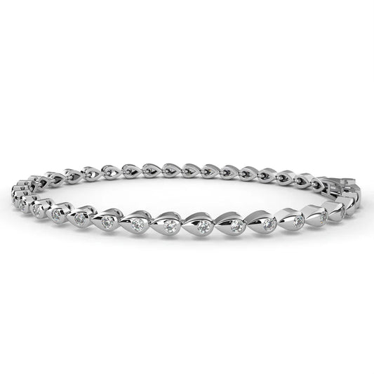 Delicate Diamond Tennis Bracelet Featuring Teardrop-Shaped Settings For An Elegant Sparkle