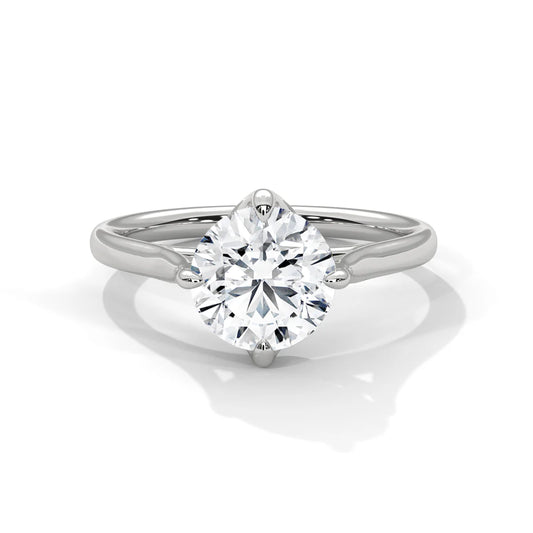Round-Cut Solitaire Diamond Ring with Classic Four-Prong Setting in 925 Silver