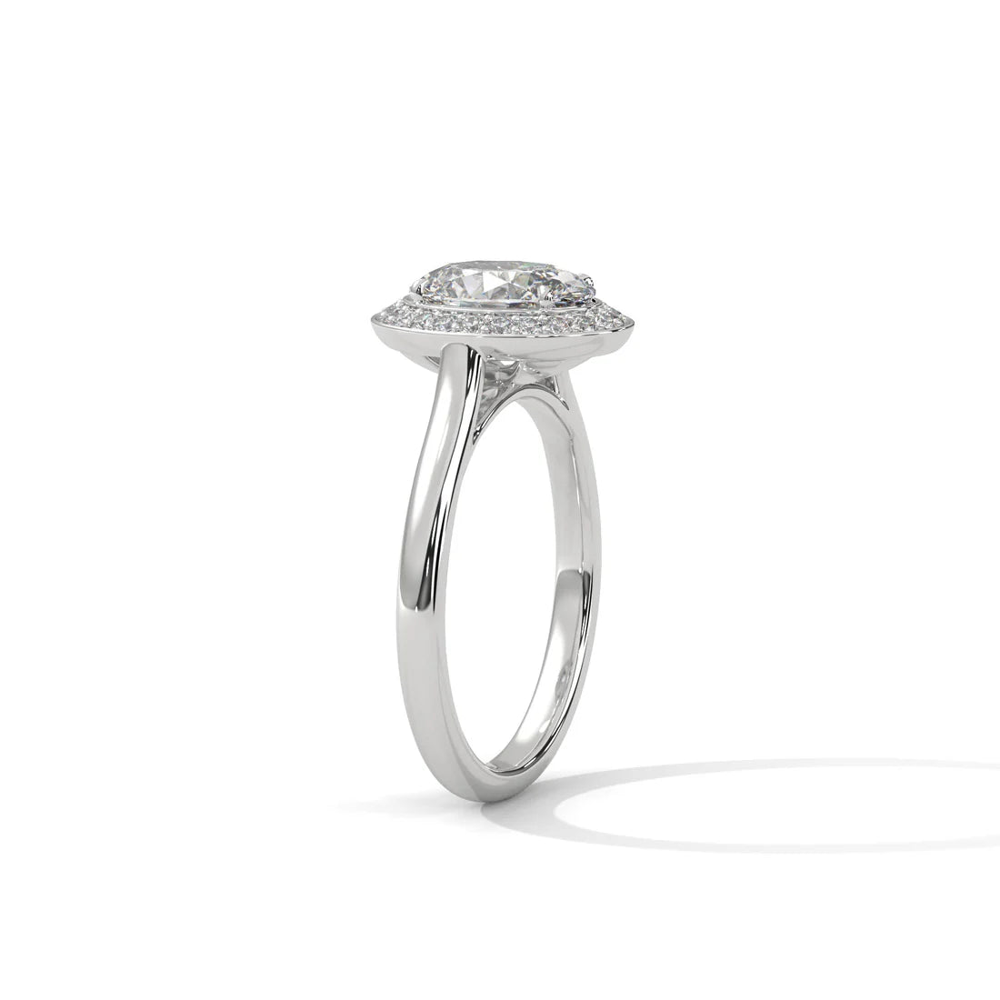 Oval-Cut Diamond Halo Ring with Dazzling Pavé Band for Timeless Elegance in 925 Silver