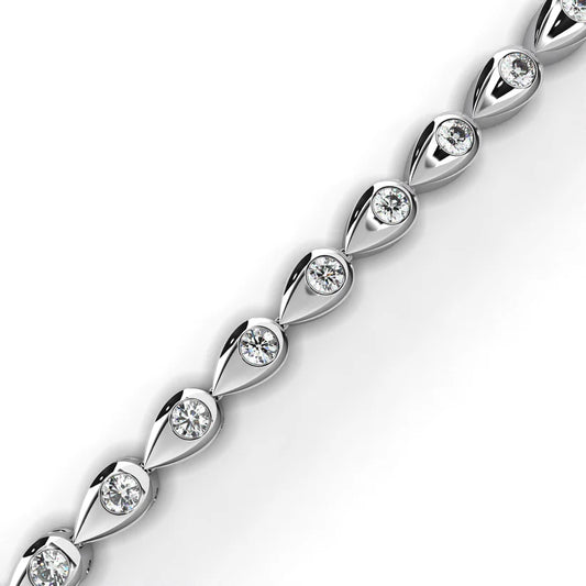 Delicate Diamond Tennis Bracelet Featuring Teardrop-Shaped Settings For An Elegant Sparkle
